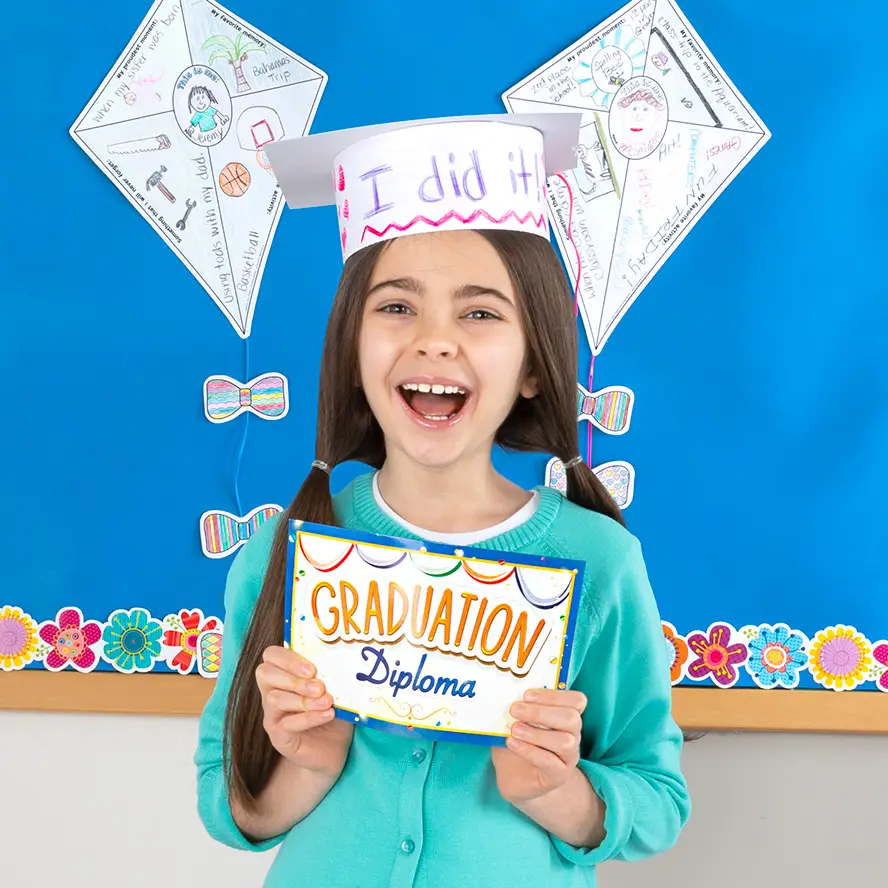 Student celebrating graduation with a certificate